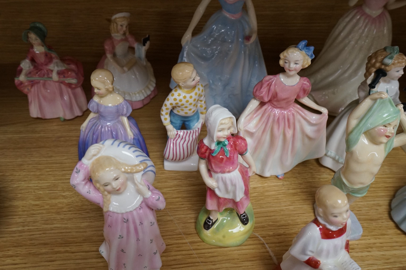 A collection of Royal Doulton figures to include Treasure Island, The Land of Nod, Hope, Bo Peep, Marie, etc, largest 22cm high